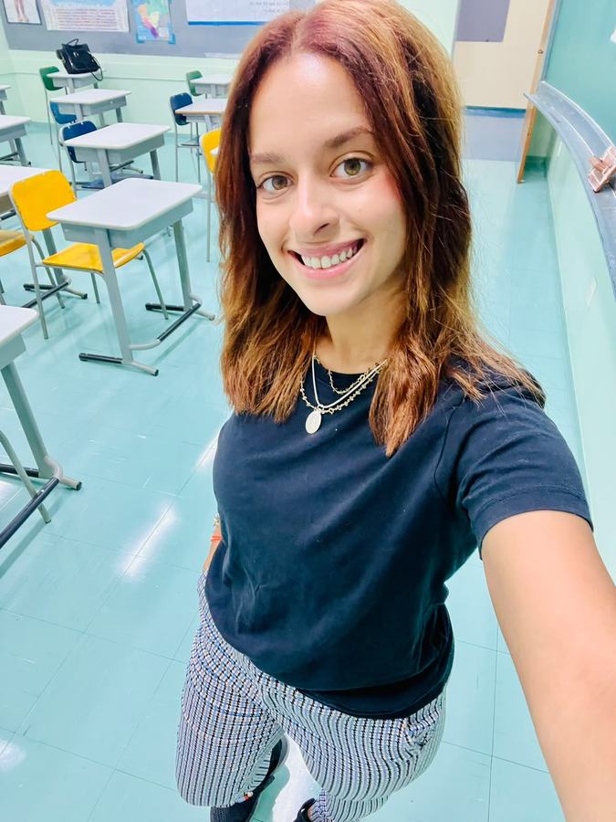 Beatriz in her classroom